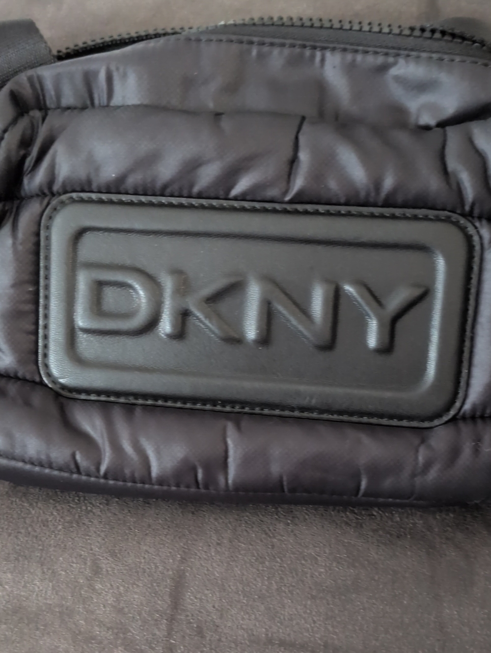 DKNY Black Quilted Belt Bag with Embossed Logo